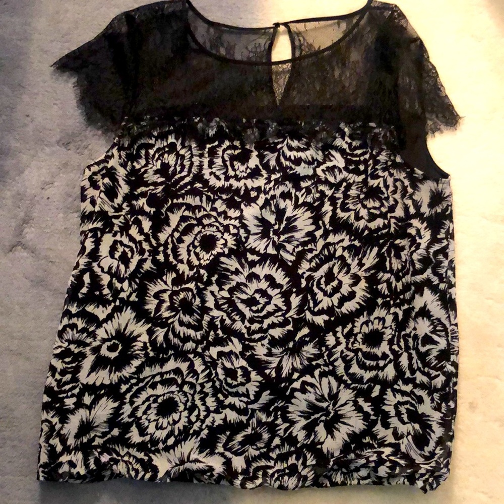 Ann Taylor blouse black and white floral print. See through lace shoulders.